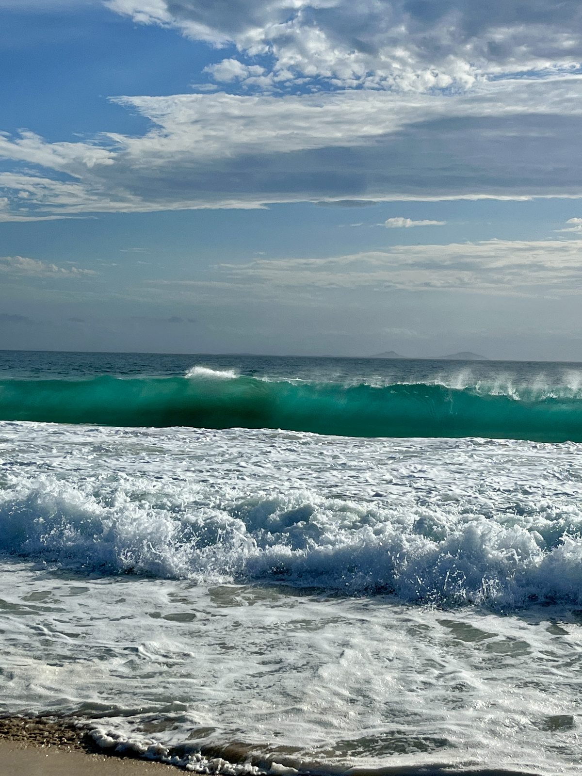 Turquoise surf breaking at Bennetts Beach, Port Stephens NSW