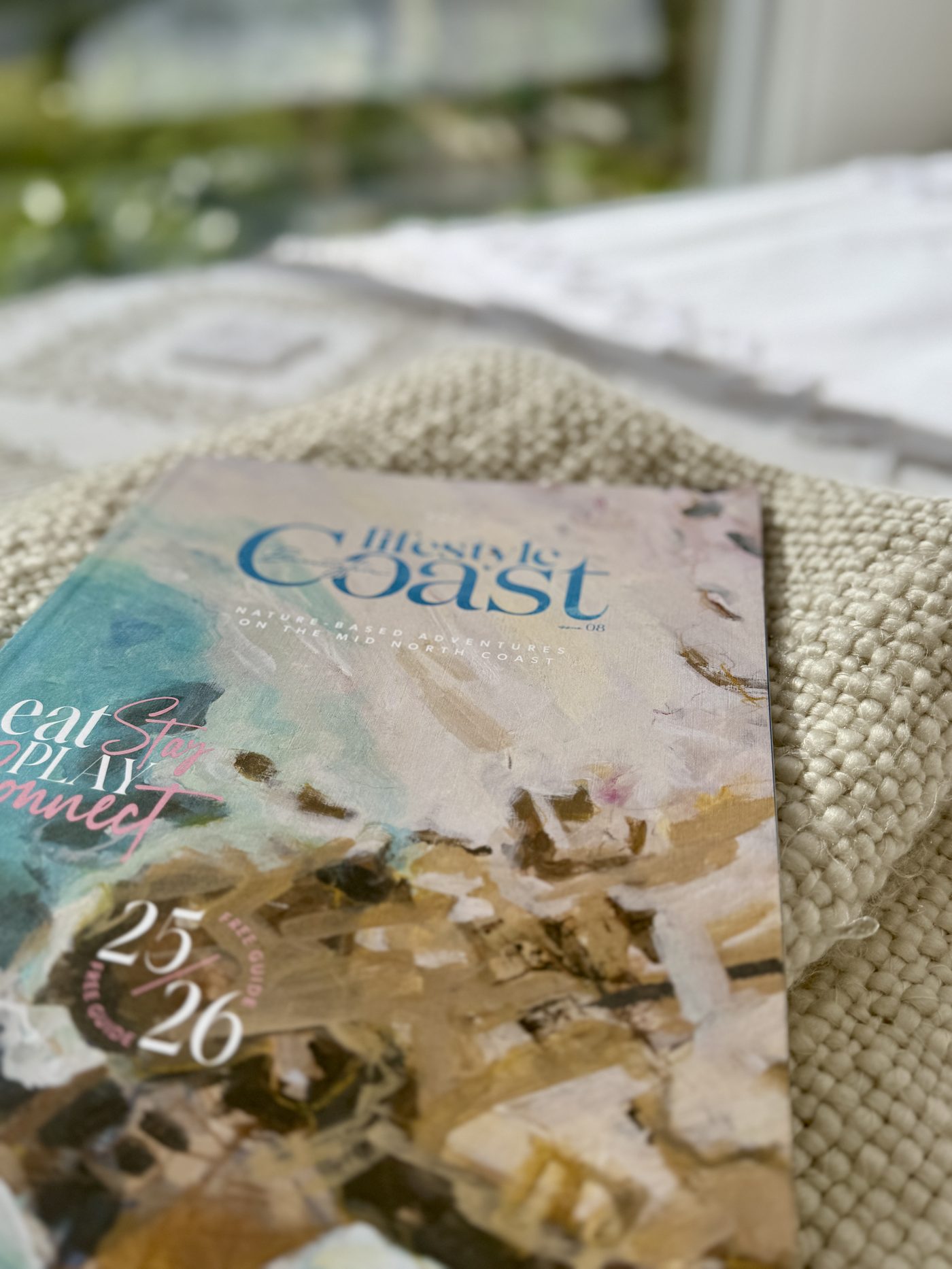 Curled up with a local magazine at Drift